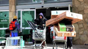 В канун «конца света» в Аргентине массового грабили супермаркеты