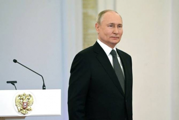 Путин побеждает на выборах, набрав 87,34% голосов по результатам подсчета 98% бюллетеней