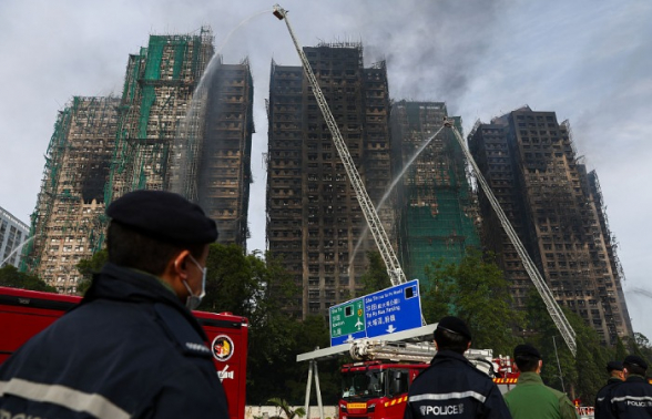 Число жертв пожара в Гонконге превысило 90 человек